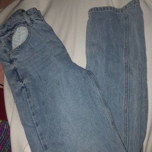 Straight leg, light blue wash, split hem, high rise jeans from FashionNova